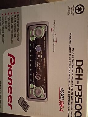 PIONEER car stereo receiver in black with green accents